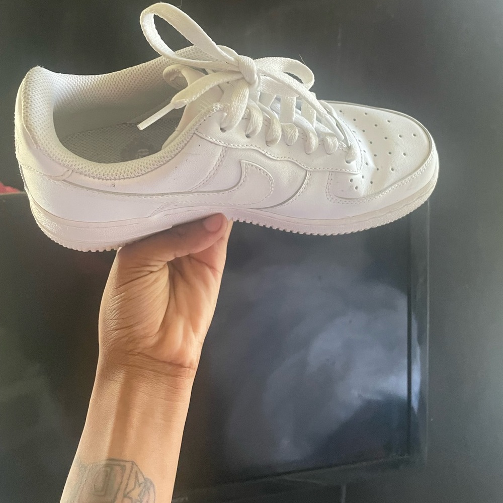 Two pairs of Nike Air Force ones black /white